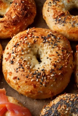 Delicious protein bagel topped with seeds and herbs for a nutritious meal.