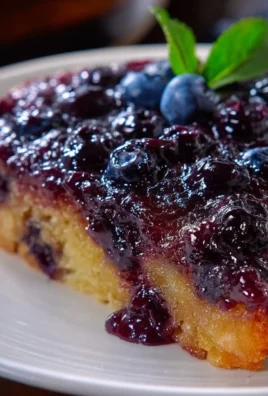 Caramelized Blueberry Upside Down Cake on a white plate