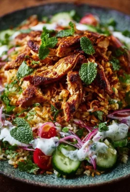 Chicken Shawarma Crispy Rice Salad served in a bowl with fresh herbs
