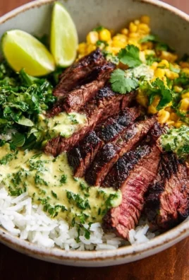 Delicious Cilantro Lime Steak and Rice Bowls garnished with fresh ingredients.