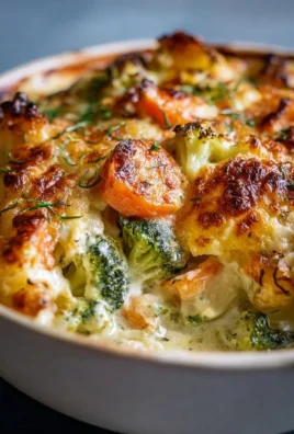 Creamy winter vegetable casserole with a mix of seasonal vegetables and cheese