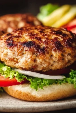 Delicious and healthy turkey burger served with fresh vegetables