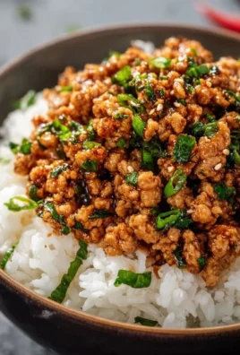 Honey Garlic Ground Turkey dish served on a plate with fresh vegetables