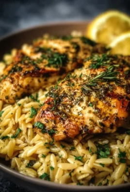Instant Pot Lemon Herb Chicken served with orzo and fresh herbs.