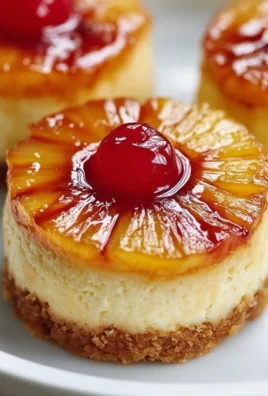 Mini pineapple upside-down cheesecakes served on a plate