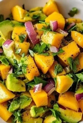 Colorful Avocado Mango Salad with fresh ingredients in a bowl