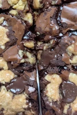 Delicious brown butter brookies served on a plate with chocolate chips