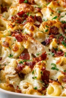 Crazy Good Casserole dish served on a plate with colorful vegetables and cheese