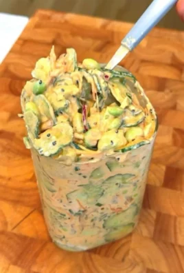 Creamy Asian cucumber salad with fresh ingredients and a tangy dressing