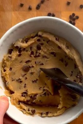 Delicious and safe edible cookie dough in a bowl with chocolate chips