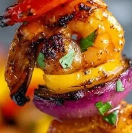 Delicious grilled shrimp kabobs garnished with vegetables for a romantic dinner