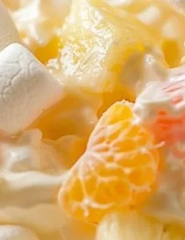 Delicious Hawaiian Fruit Salad featuring tropical fruits like pineapple and mango.