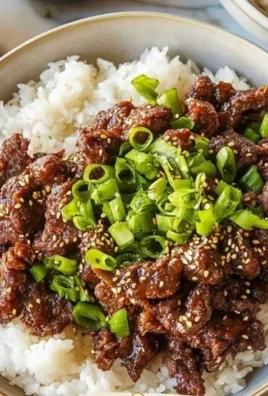 Delicious Korean BBQ beef bowls topped with vegetables and flavorsome sauce