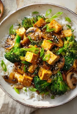 Delicious mushroom and tofu stir-fry served in a bowl