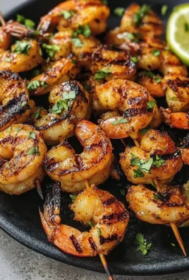 Zesty margarita grilled shrimp kabobs ready to serve at a summer BBQ.