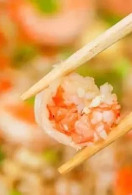 Delicious shrimp fried rice served in a bowl with colorful vegetables
