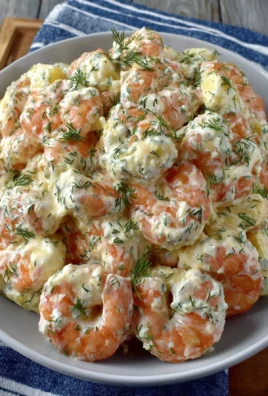 Fresh shrimp salad recipe with vibrant vegetables and a zesty dressing.