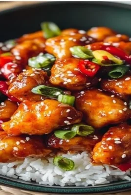 Plate of Sweet Chili Chicken garnished with vegetables