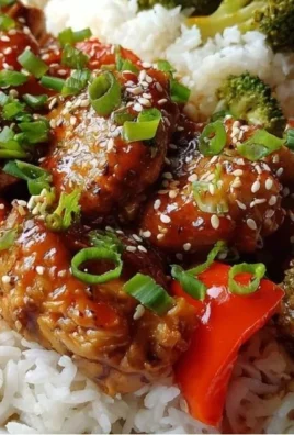 Sweet Chili Chicken with rice and vegetables in a vibrant bowl