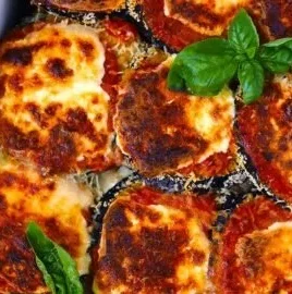 Delicious easy eggplant parmesan layered with cheese and tomato sauce