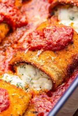 Delicious Eggplant Rollatini filled with ricotta cheese and marinara sauce