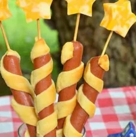 Firecracker Hot Dogs garnished with colorful toppings for a patriotic barbecue