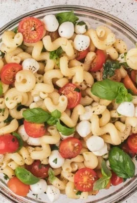 A plate of healthy pasta dishes featuring vegetables and whole grain noodles