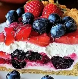 No-bake Red White & Blue mixed berry yum yum dessert with fresh berries.