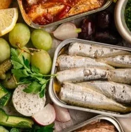 Colorful Spring Tinned Fish Board showcasing various tinned fish delicacies.